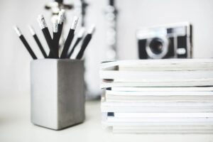 A close up of some books and pencils