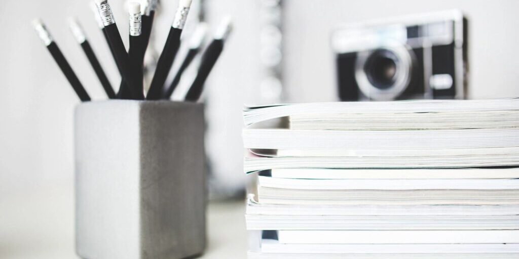 A close up of some books and pencils